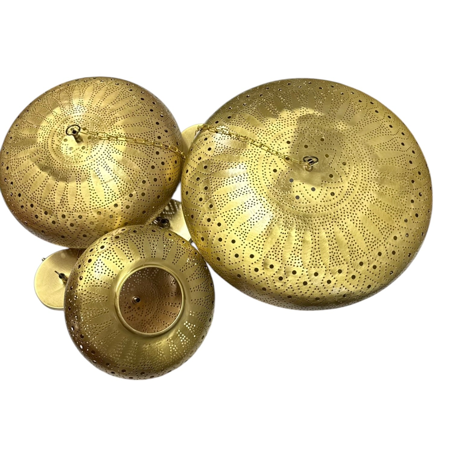 Three gold cymbals on a white background