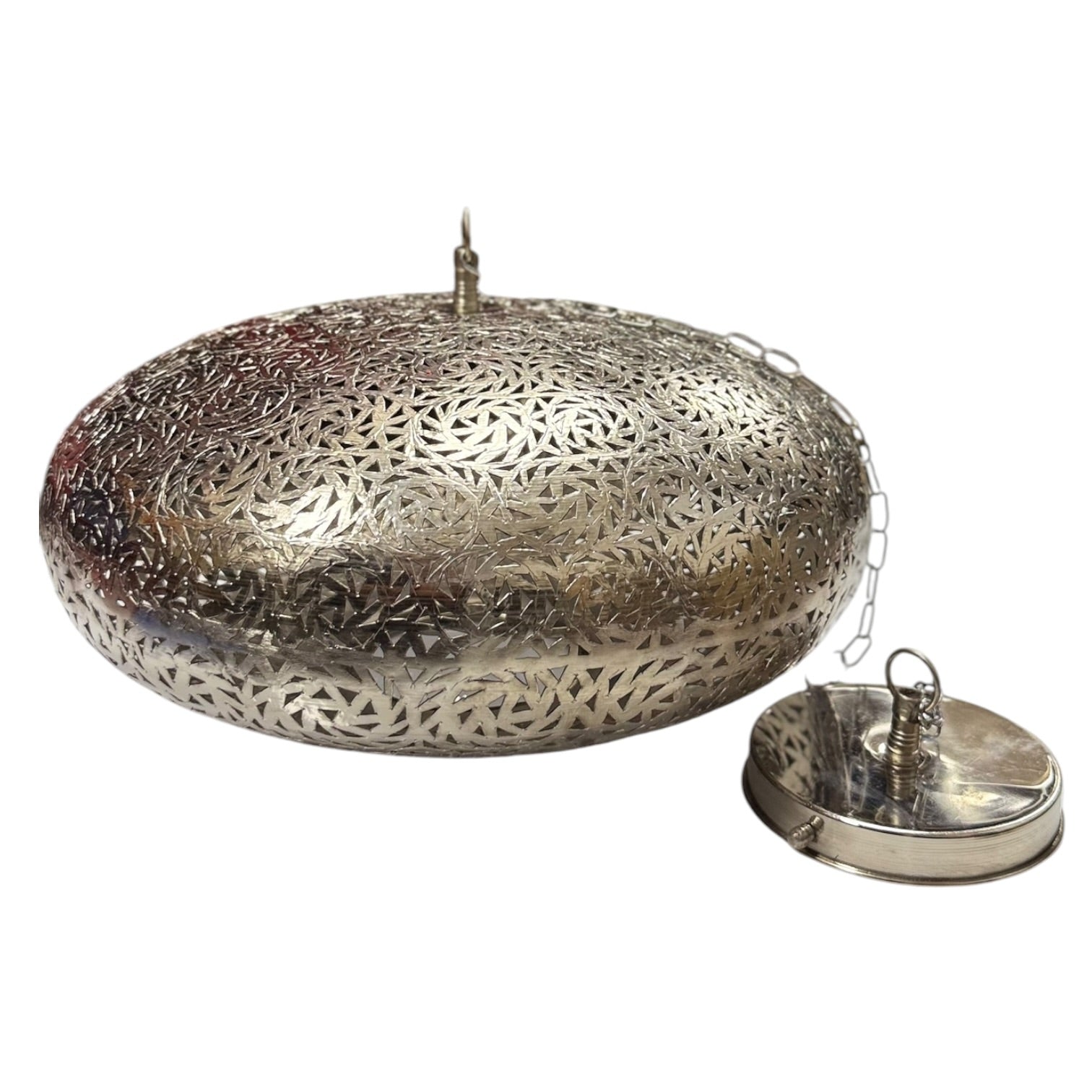 Decorative metal mesh incense burner on a white background