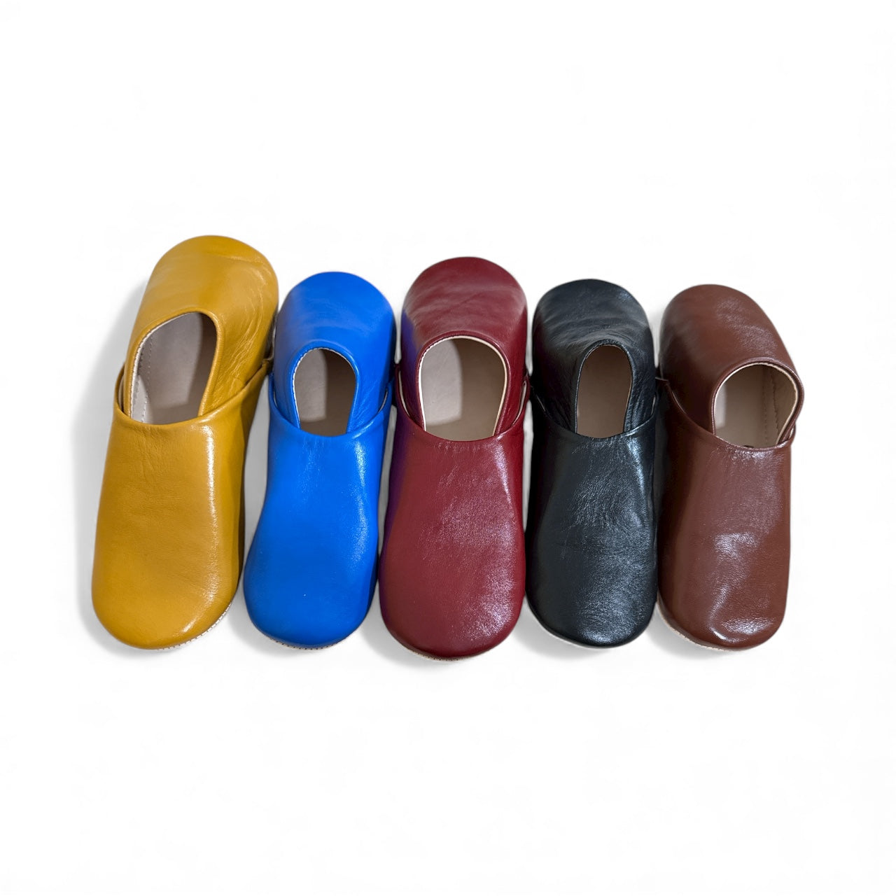 Herren-Slipper aus Leder in Senfgelb