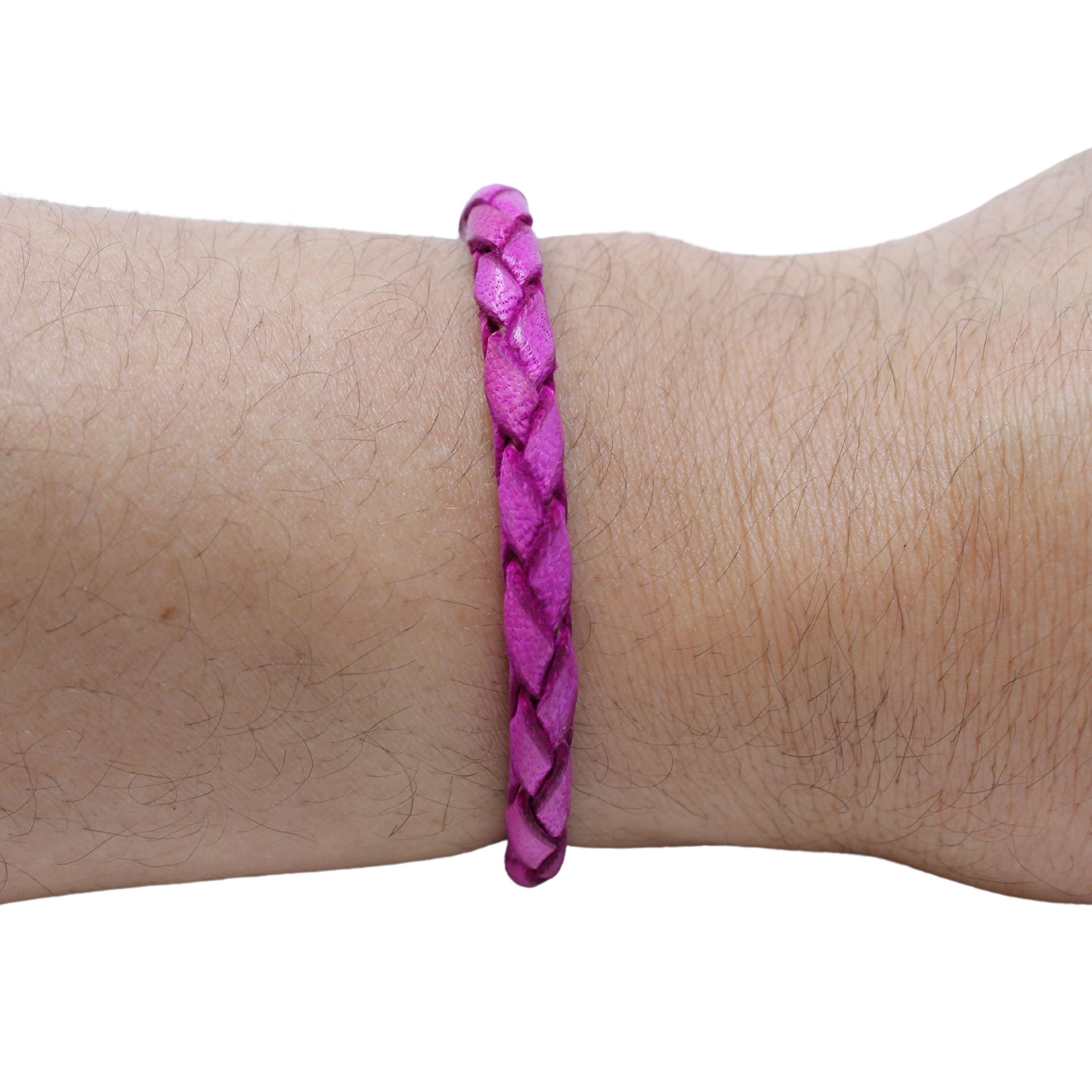 Adjustable twisted artisan leather bracelet jewelry for men and women in vibrant purple on wrist