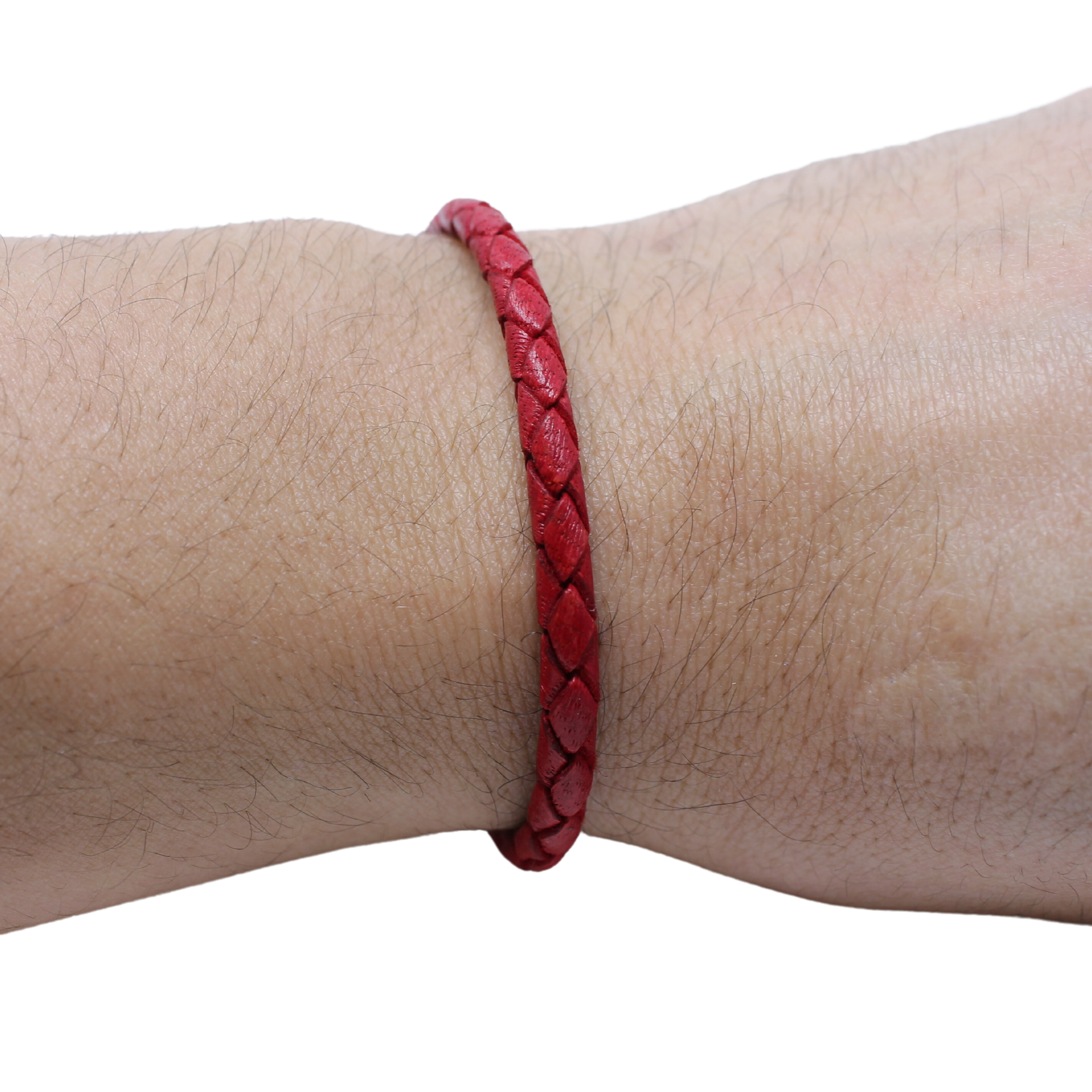 Adjustable twisted artisan leather bracelet jewelry for men and women in red on wrist by Artisan Stories