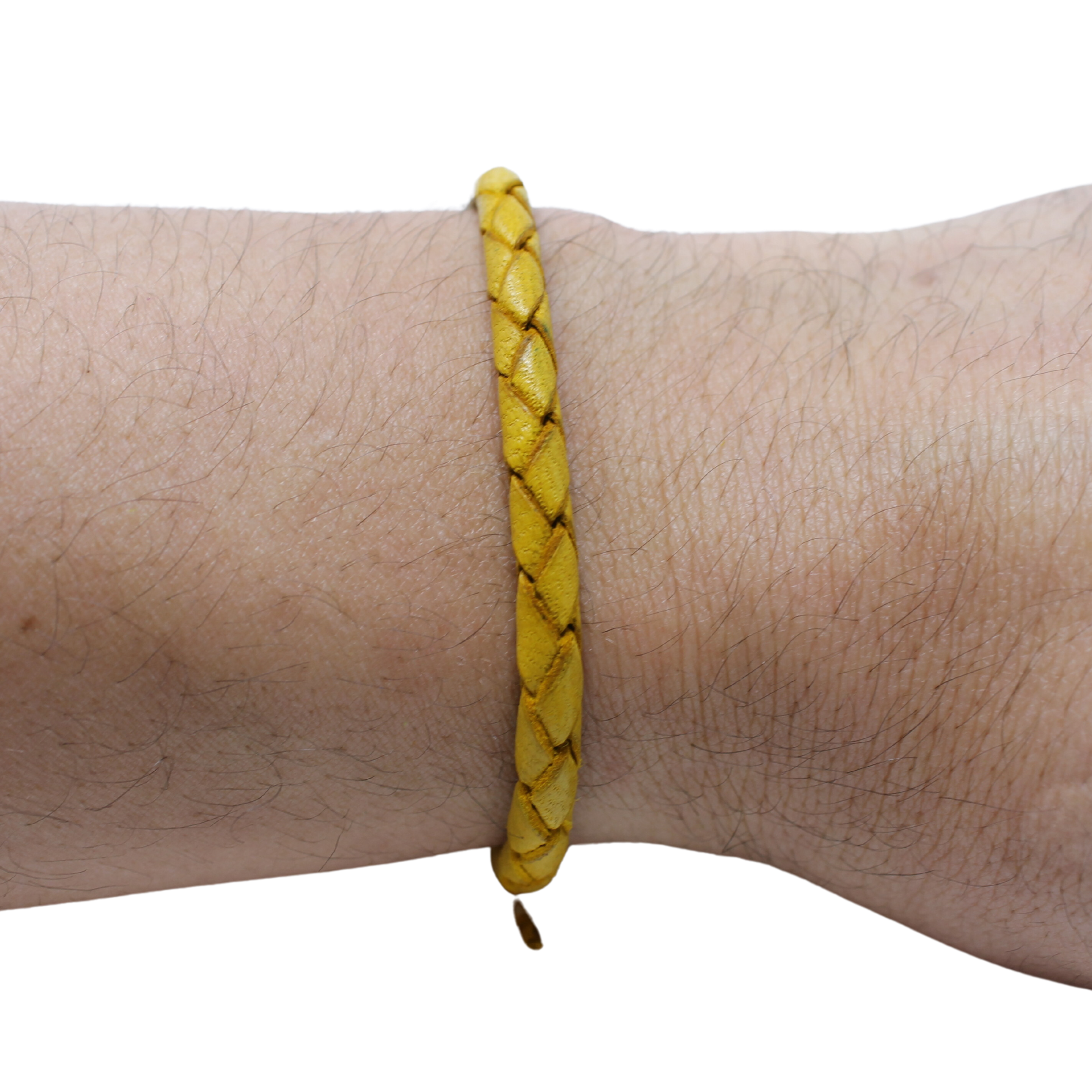 Adjustable twisted artisan leather bracelet jewelry for men and women in yellow on wrist by Artisan stories