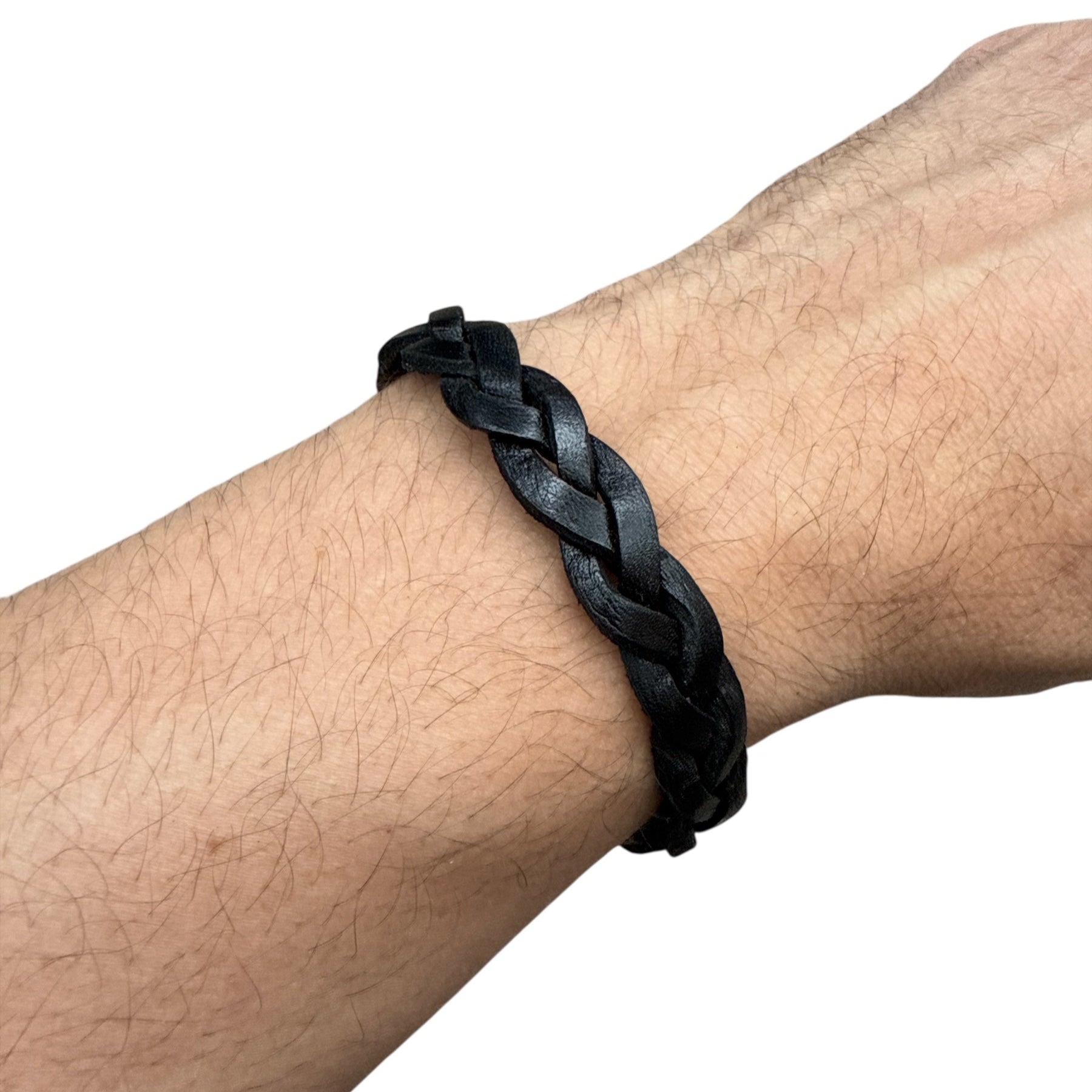 handmade braided leather bracelet in black worn on wrist accessory