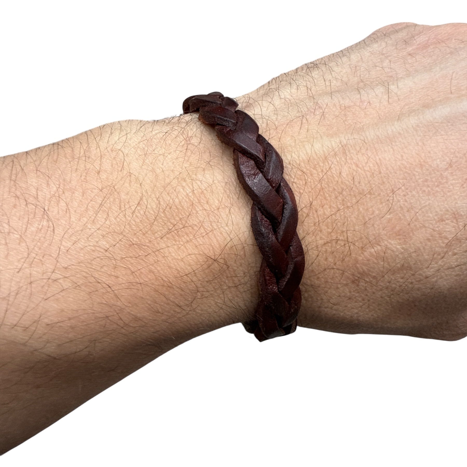handmade braided leather bracelet in dark brown worn on wrist
