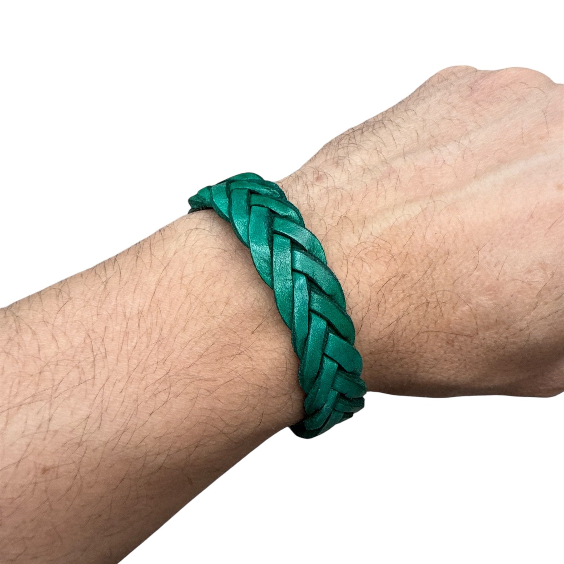 Handmade braided leather bracelet in green on wrist by Atelier Marrakech accessory