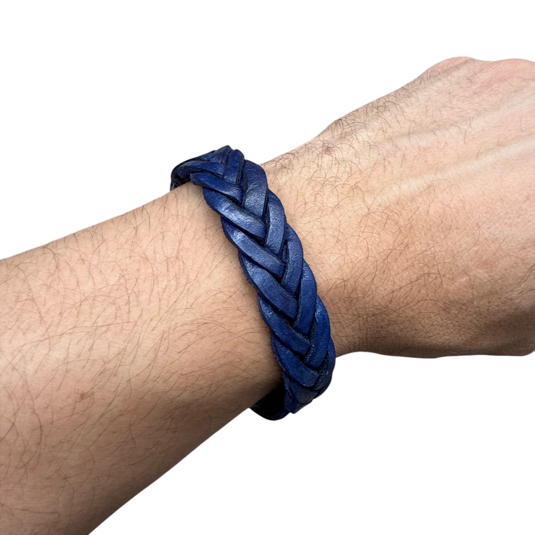 Hand wearing blue handmade braided leather bracelet accessories collection