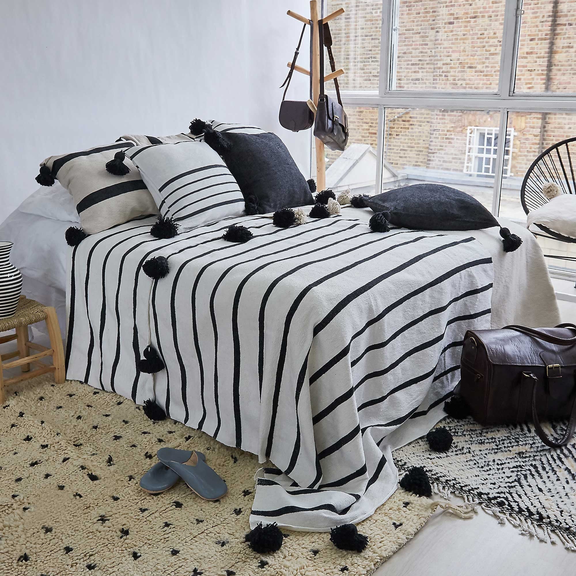Sripped Black Pom Pom Throw - Artisan Stories