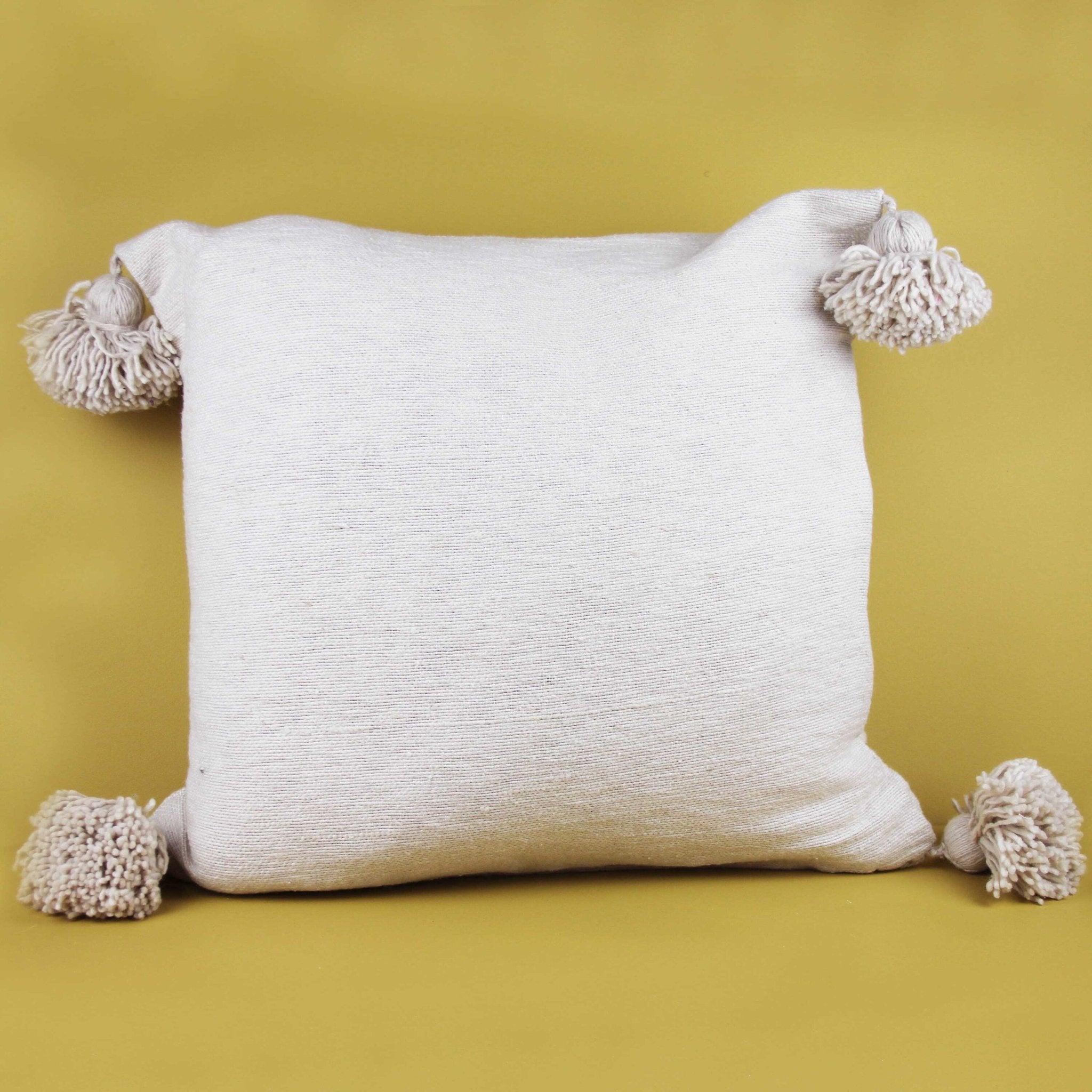 Neutral Pom Pom Cushions - Artisan Stories