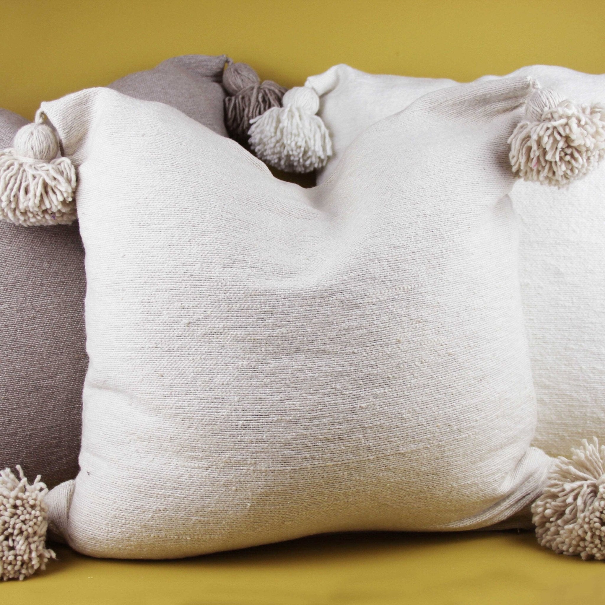Neutral Pom Pom Cushions - Artisan Stories