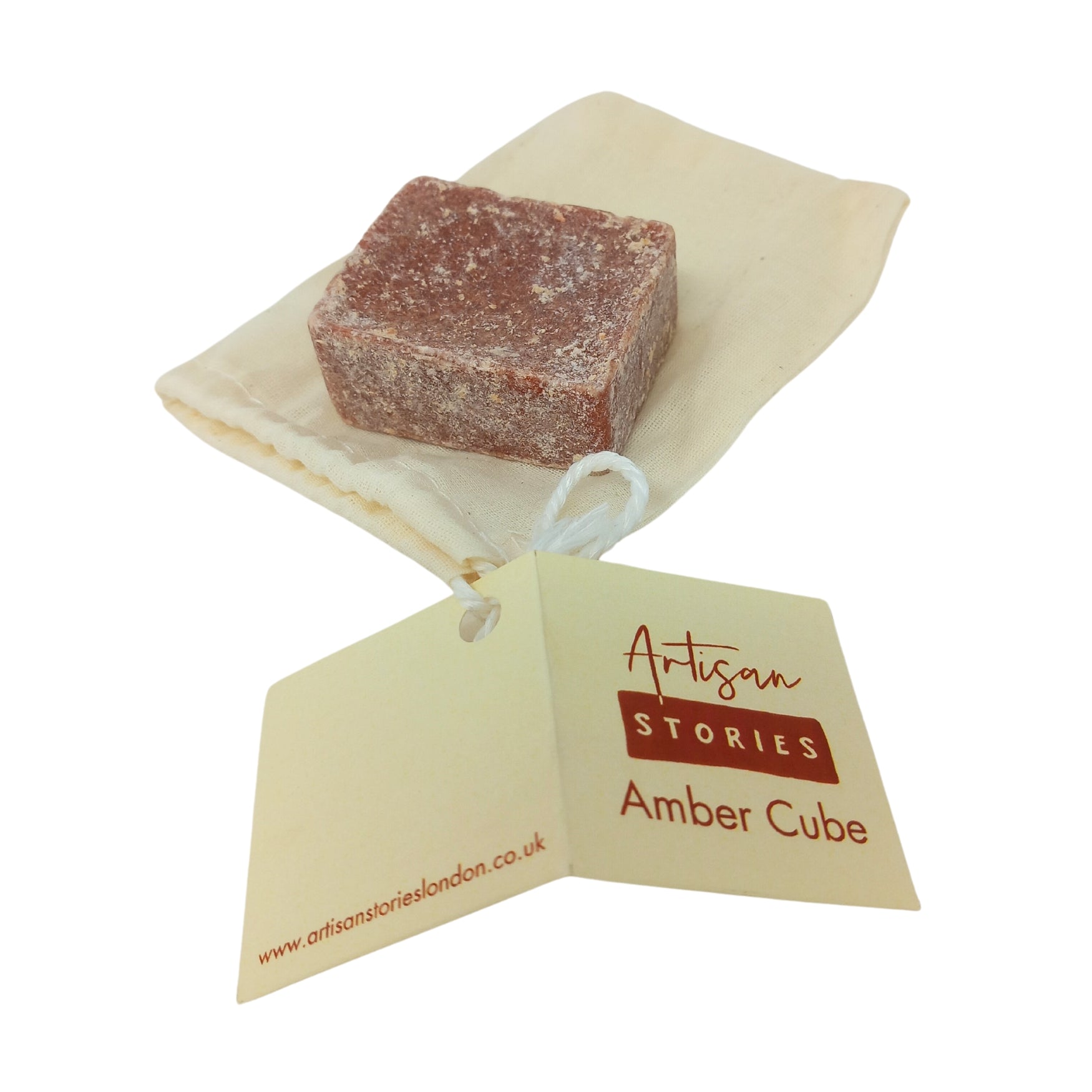 a picture of solid amber perfume cube 