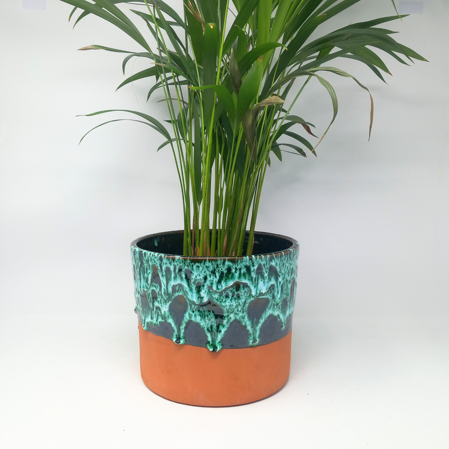 Terracotta drip-glazed plant pot