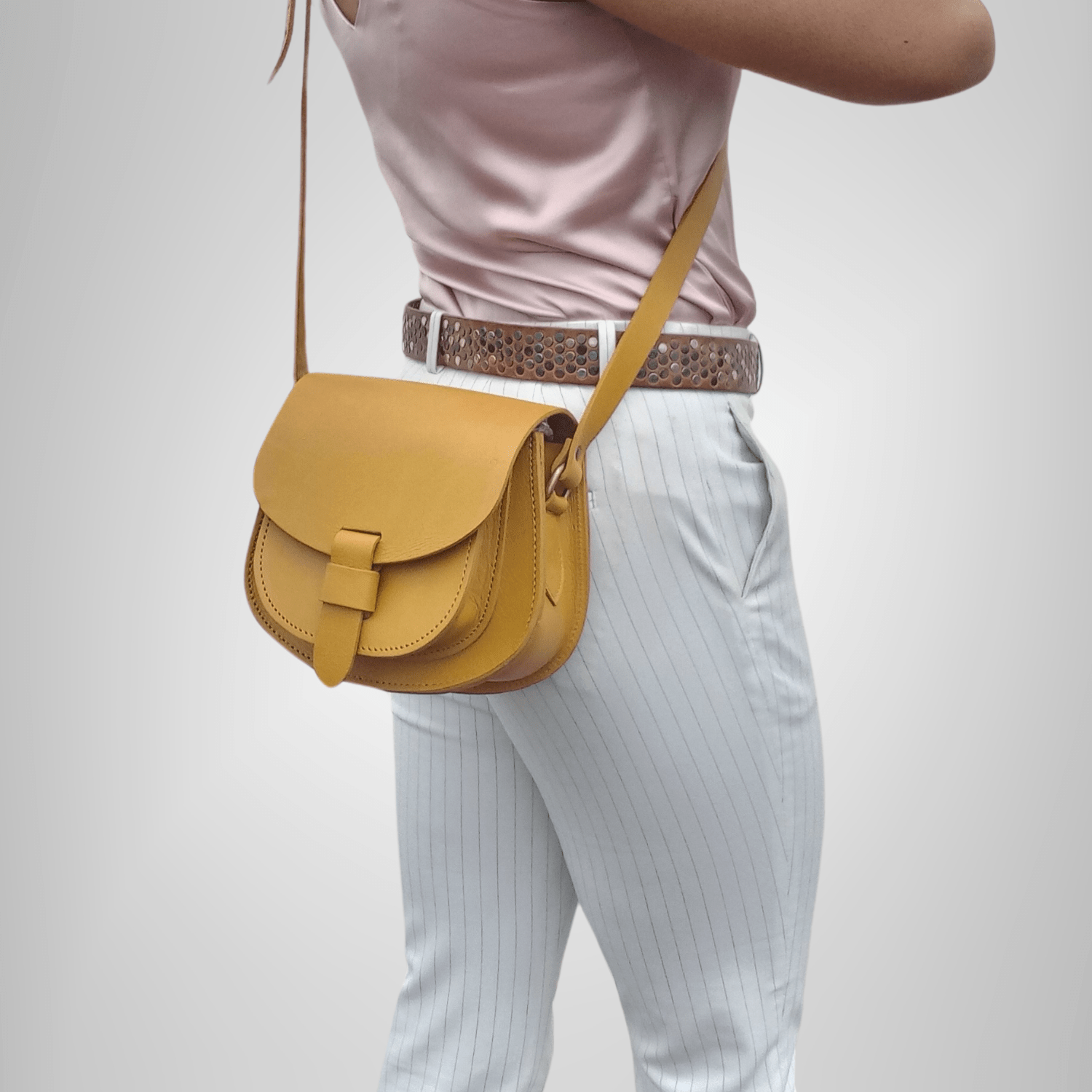 Maya yellow Leather Saddle Bag - Artisan Stories