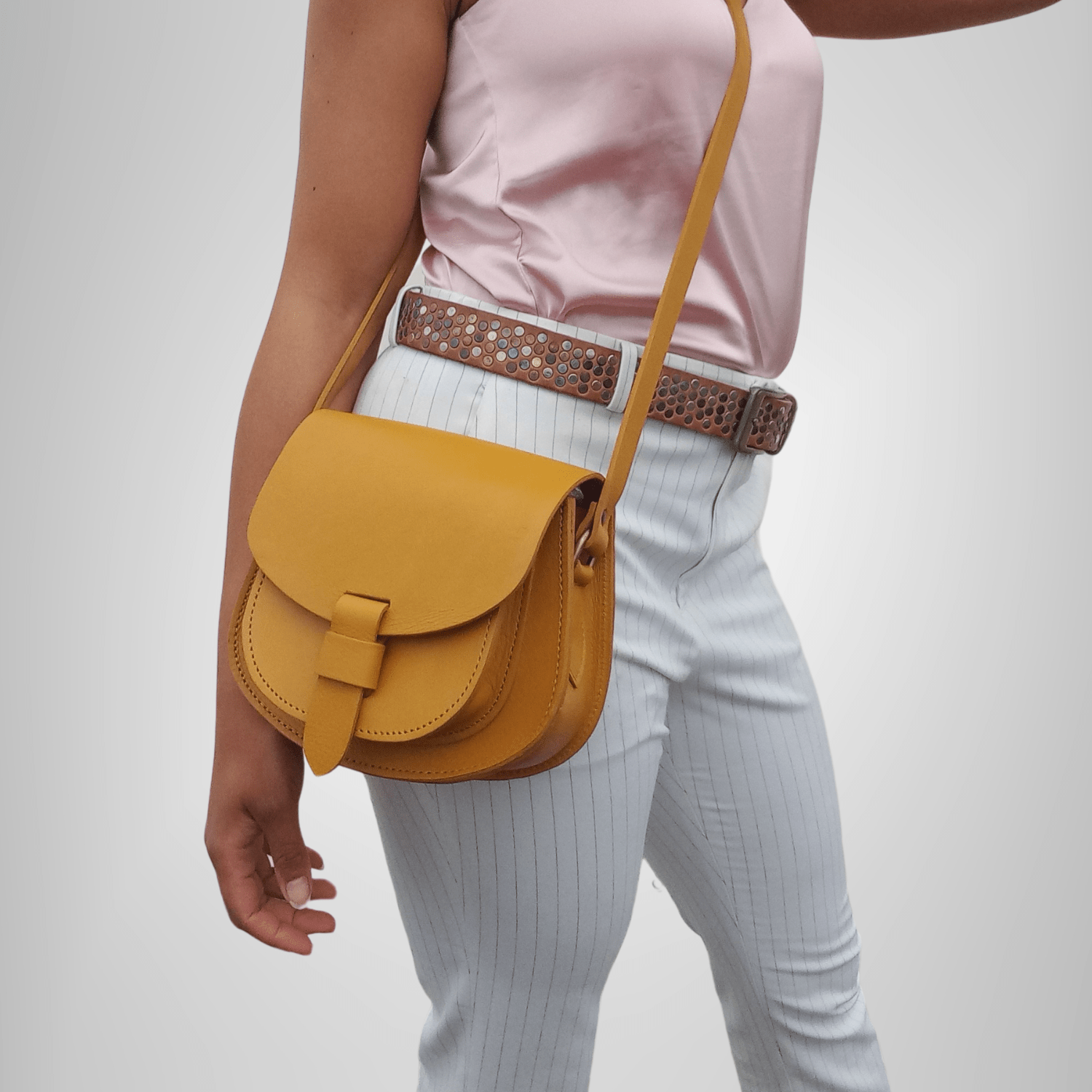 Maya yellow Leather Saddle Bag - Artisan Stories