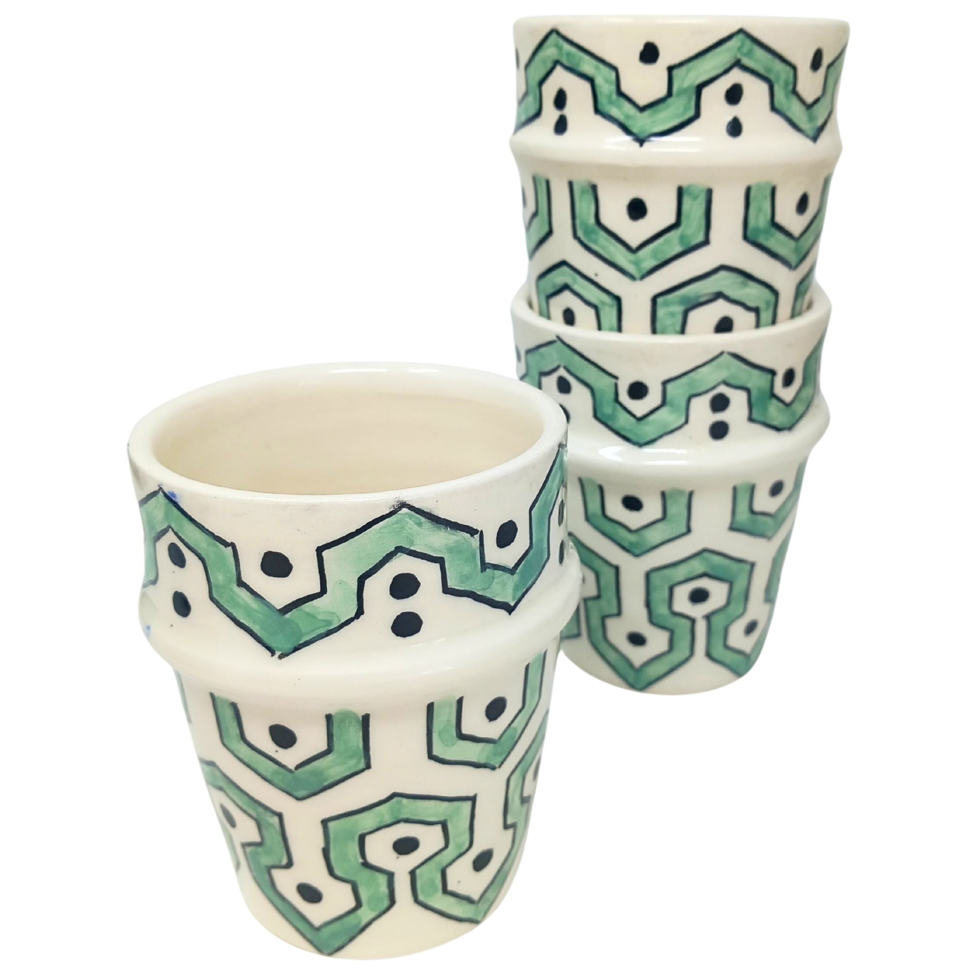 picture of three ceramic cups which have been fully handcrafted by artisans. In mint Green.