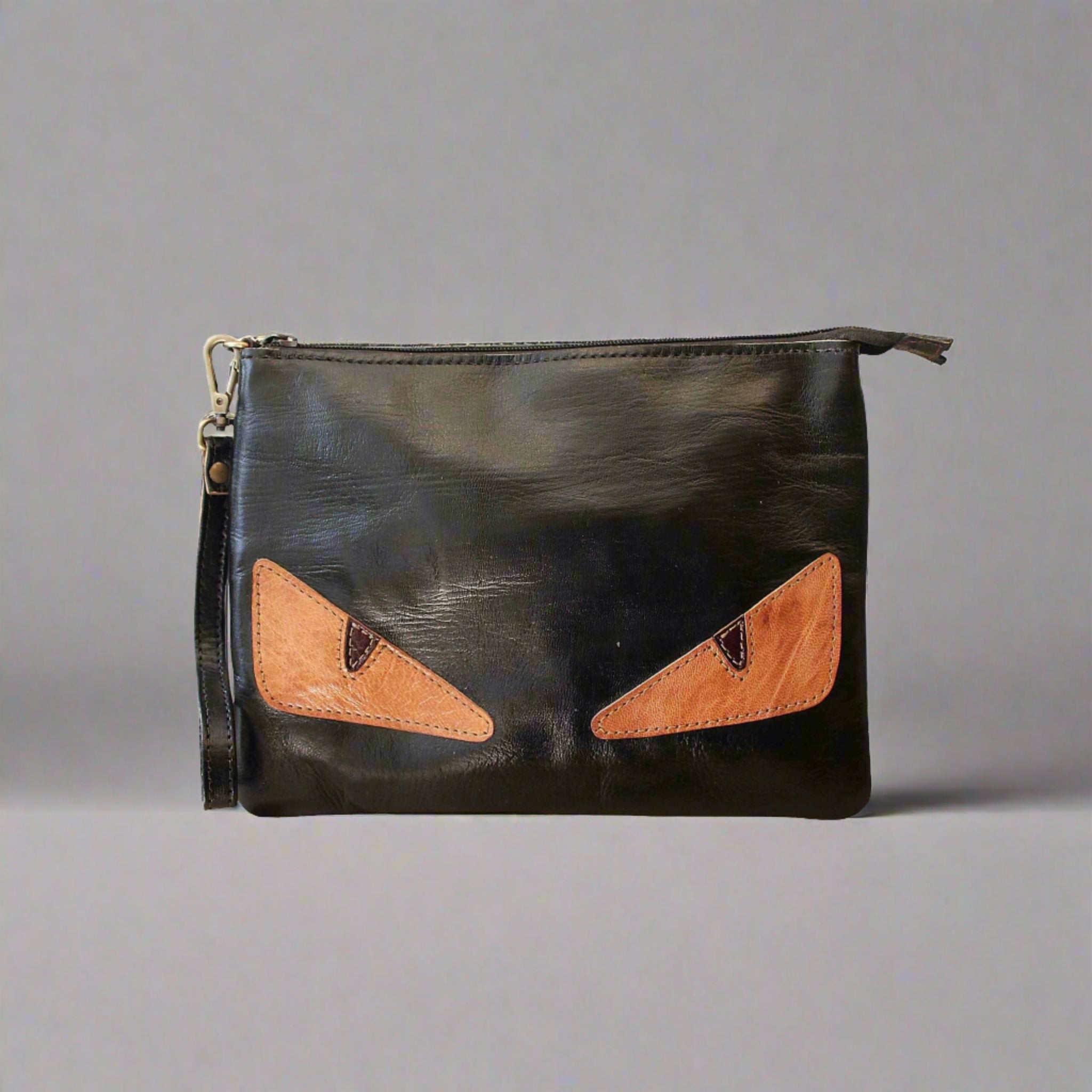 Peekaboo black leather crossbody and clutch bag - Artisan Stories