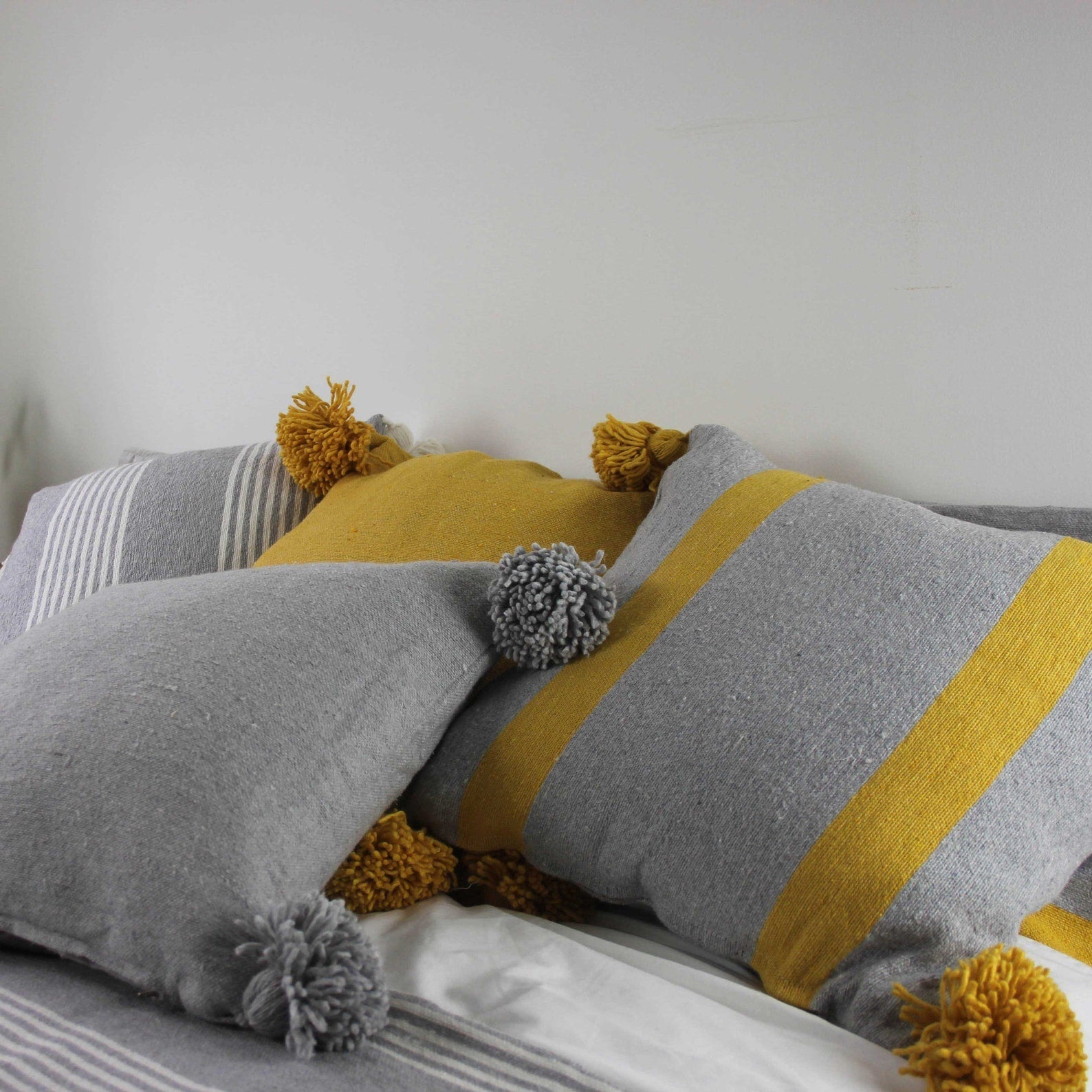 Plain Pom Pom Cushions - Artisan Stories