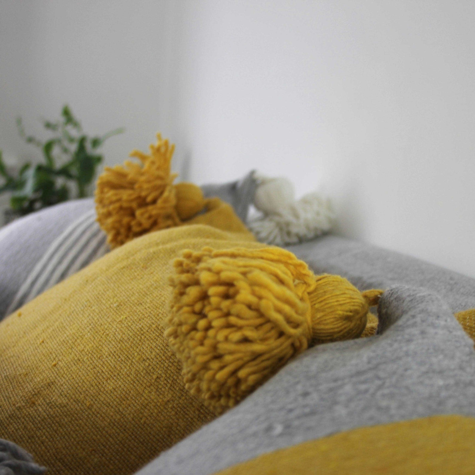 Plain Pom Pom Cushions - Artisan Stories