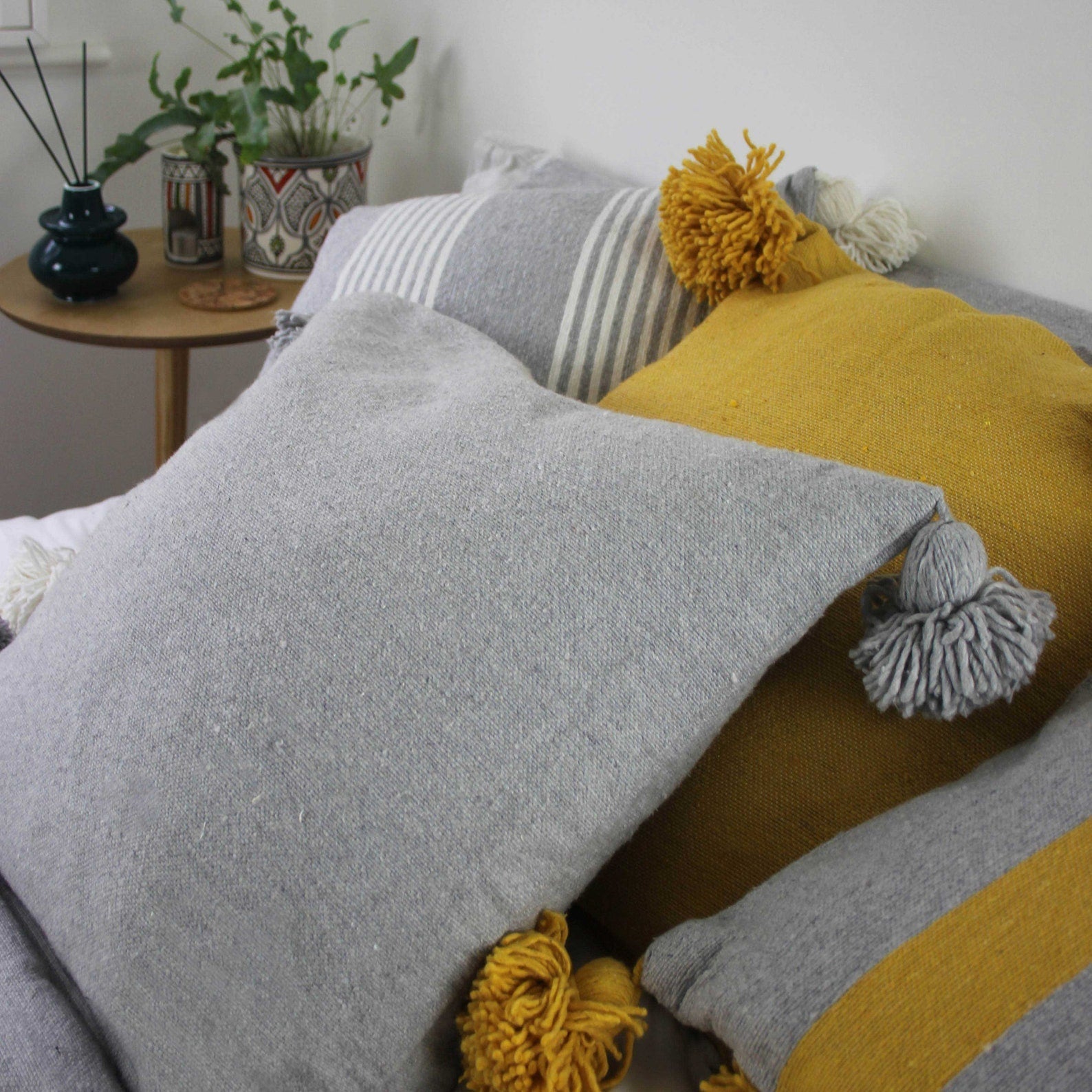 Plain Pom Pom Cushions - Artisan Stories