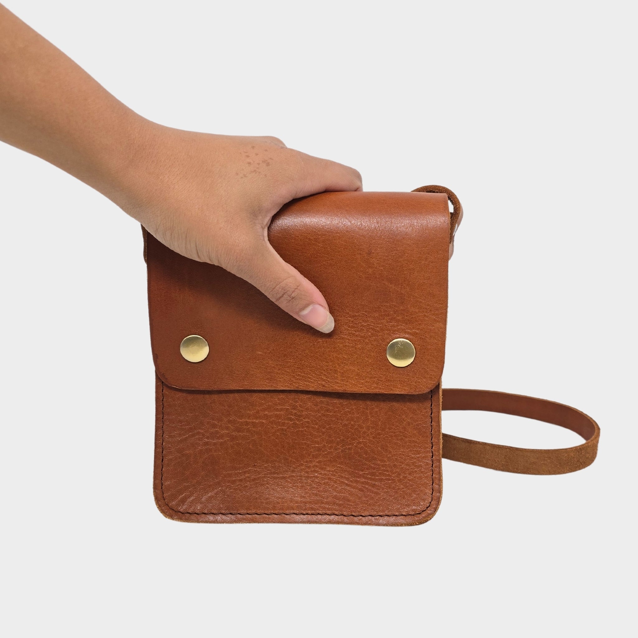 Tan Small Leather Crossbody Bag with Pop Closure - Artisan Stories