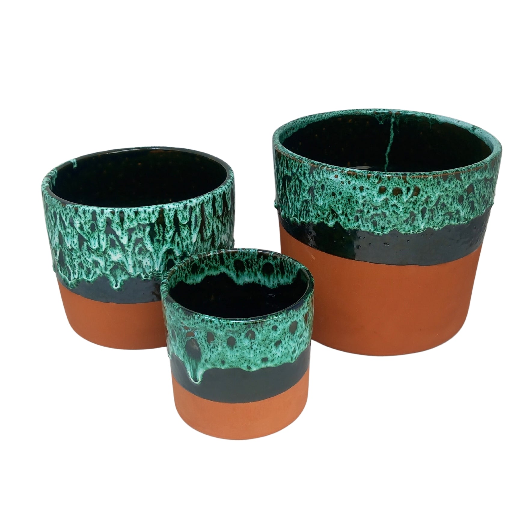 picture of three different sizes of handcrafted terracotta overpot with a green drip design