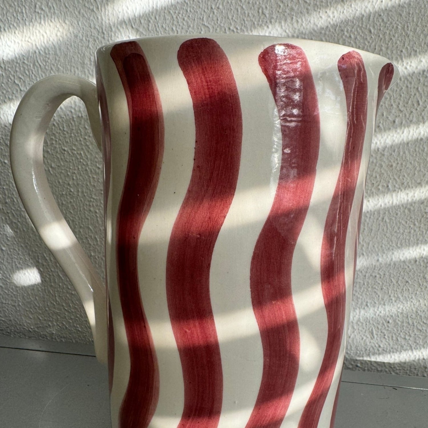 Large ceramic jug handcrafted cylinder shape pitcher with painted wave pattern