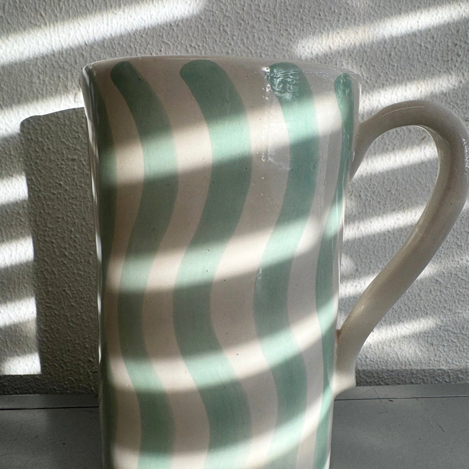 Large ceramic jug handcrafted cylinder shape pitcher with painted wave pattern